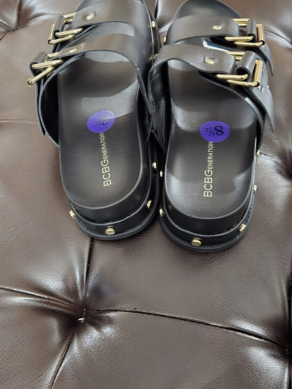 BCBGeneration Black Dual Buckle Slide Sandals with Gold Hardware